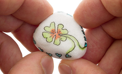 Image showing Stone with drawing of a clover four and small hearts