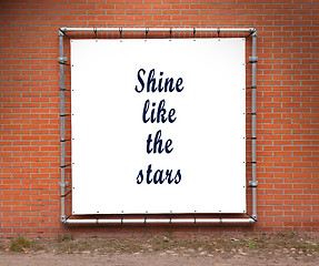 Image showing Large banner with inspirational quote on a brick wall