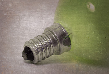 Image showing Old green lightbulb isolated on a white background