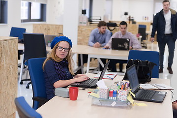 Image showing startup business, woman  working on laptop