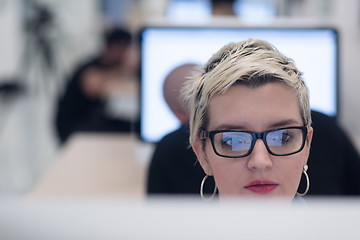 Image showing startup business, woman  working on desktop computer