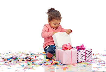 Image showing happy little baby girl with birthday presents