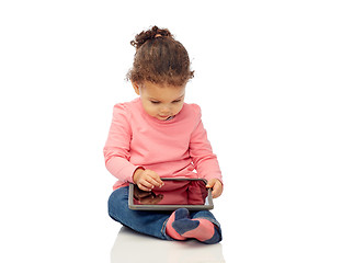 Image showing little baby girl playing with tablet pc computer