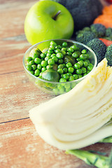 Image showing close up of ripe vegetables on wooden table