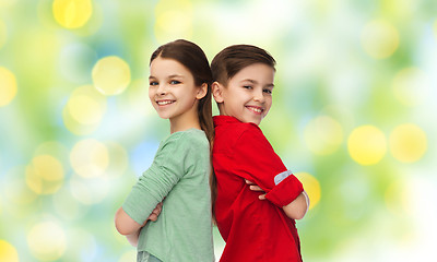 Image showing happy boy and girl standing together