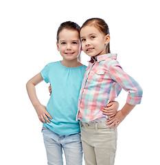 Image showing happy smiling little girls hugging