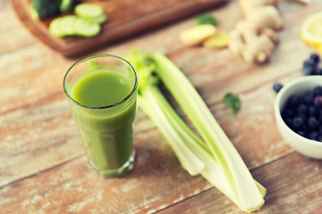 Image showing close up of fresh green juice glass and celery