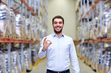 Image showing happy man at warehouse showing ok gesture