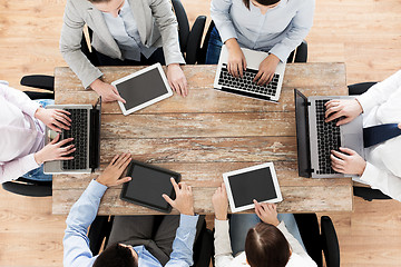 Image showing business team with laptop and tablet pc