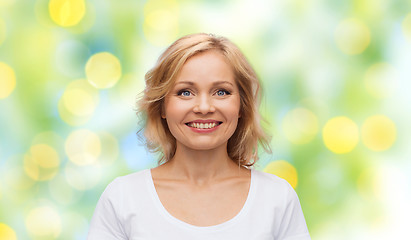 Image showing smiling woman in blank white t-shirt