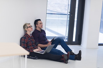 Image showing startup business, couple working on laptop computer at office