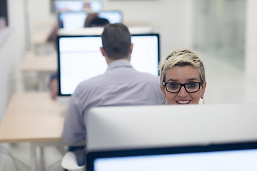 Image showing startup business, woman  working on desktop computer