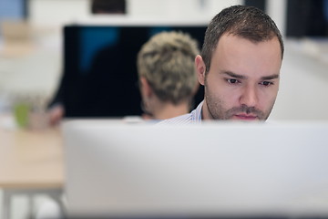 Image showing startup business, software developer working on desktop computer