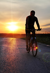 Image showing cyclist at sunset time