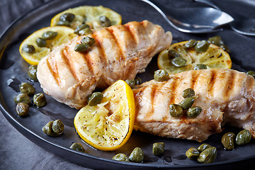 Image showing grilled chicken breasts on gray plate