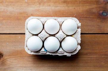 Image showing close up of white eggs in egg box or carton