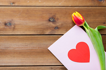 Image showing close up of flowers and greeting card with heart