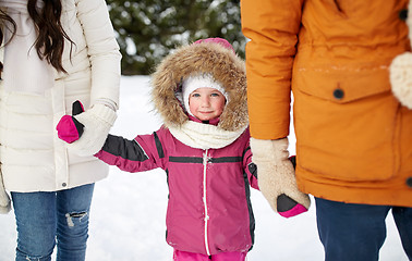 Image showing happy family with child in winter clothes outdoors