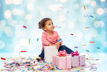 Image showing happy little baby girl with birthday presents