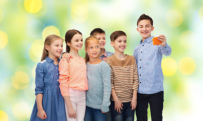 Image showing happy children talking selfie by smartphone