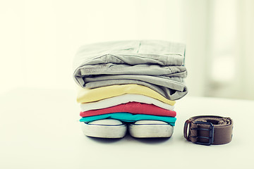 Image showing close up of clothes and accessories on table