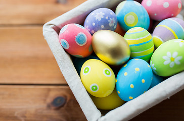 Image showing close up of colored easter eggs in basket