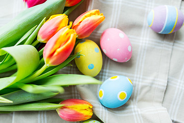 Image showing close up of colored easter eggs and flowers