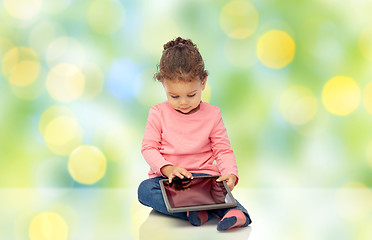 Image showing little baby girl playing with tablet pc computer