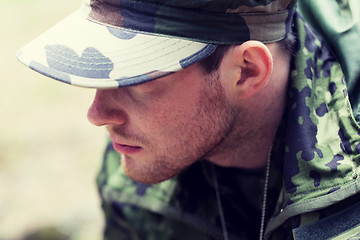Image showing close up of young soldier in military uniform