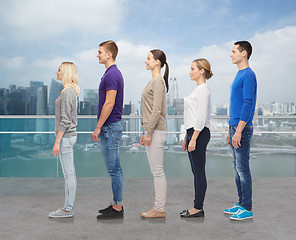 Image showing group of people over city waterside background