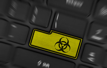 Image showing Symbol on button keyboard, biohazard