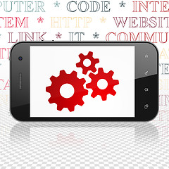 Image showing Web development concept: Smartphone with Gears on display