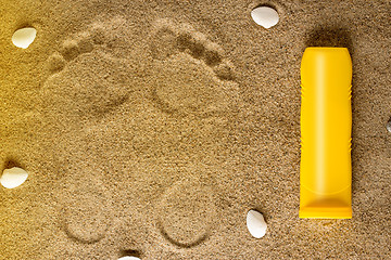 Image showing Sea shells on sand. Summer beach background. 