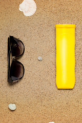 Image showing Sea shells on sand. Summer beach background. 