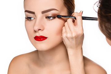 Image showing Beautiful female eyes with make-up and brush