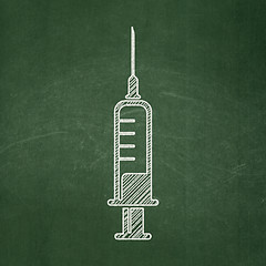 Image showing Health concept: Syringe on chalkboard background