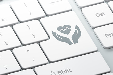 Image showing Insurance concept: Heart And Palm on computer keyboard background