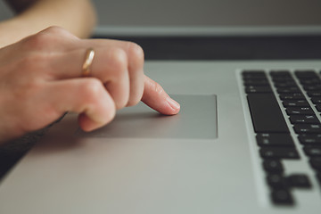 Image showing woman\'s hands working on laptop computer