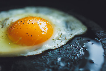 Image showing fried egg on the pan