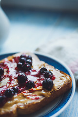 Image showing Sandwich with peanut butter and black currant jam