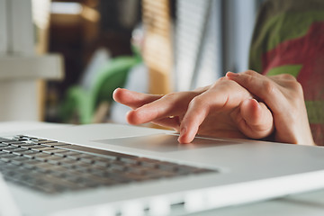 Image showing woman\'s hands working on laptop computer