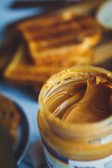 Image showing Open jar of peanut butter 