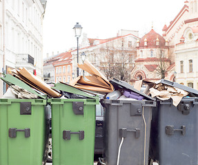 Image showing Plastic bins full of trash