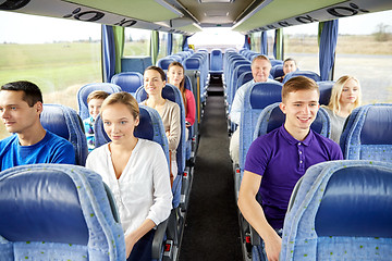 Image showing group of happy passengers in travel bus