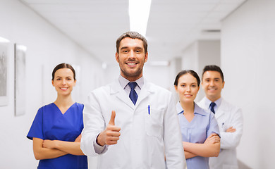 Image showing medics or doctors at hospital showing thumbs up