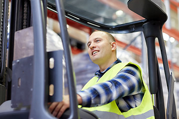 Image showing man operating forklift loader at warehouse