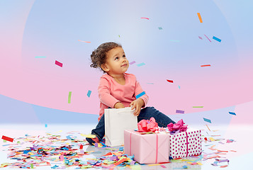 Image showing happy little baby girl with birthday presents