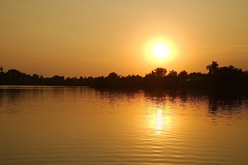 Image showing Sunset over water