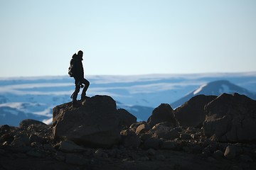 Image showing Standing on a cliff