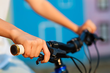 Image showing teenage girl and bike in city